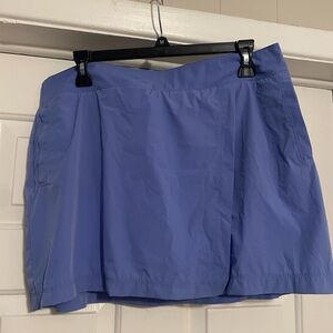 Calvin Klein skort never worn. Has built in shorts and has pockets